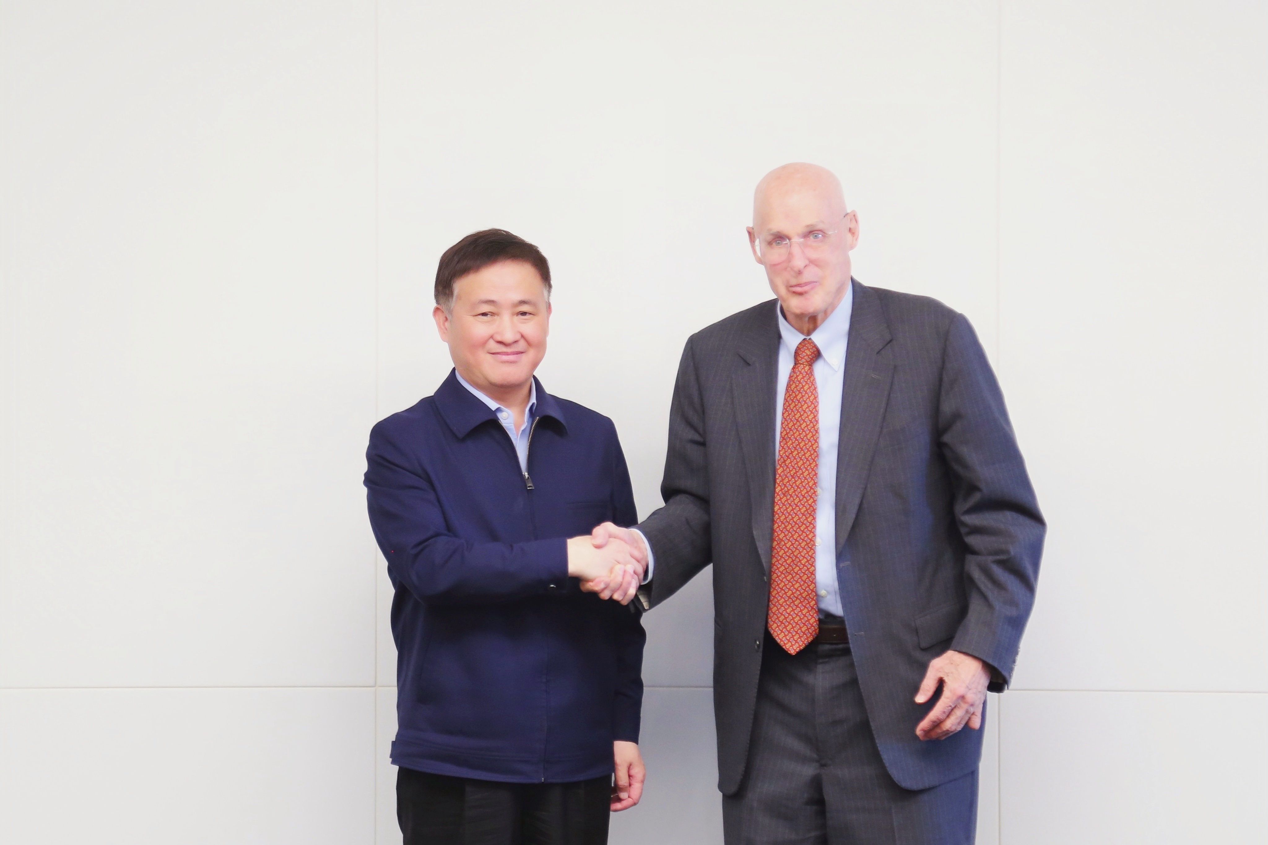 1742260839679823.jpg 中国人民银行行长潘功胜会见美前财长保尔森.jpg